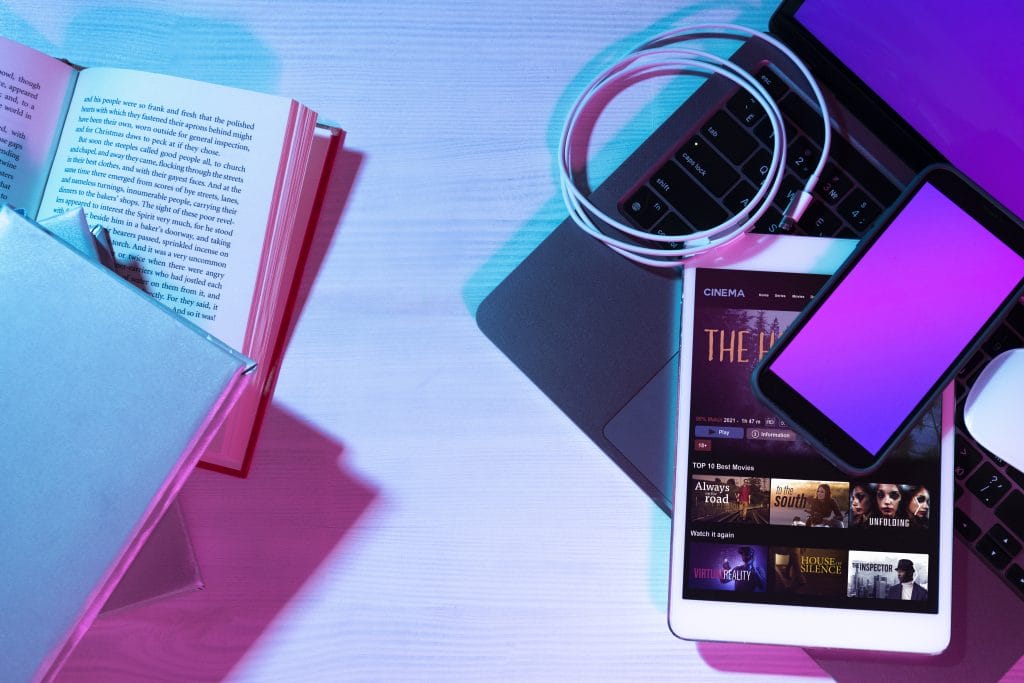 Body-neutral resources, such as a laptop and a tablet, are placed on a table.